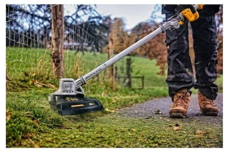 Žoliapjovė - trimeris DeWalt DCMST561N-XJ; 18 V (be akumuliatoriaus ir pakrovėjo)