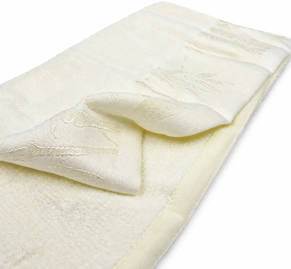 34 × 74 cm kreminės spalvos bambuko pluošto ir medvilnės rankšluostis su bambukų raštu