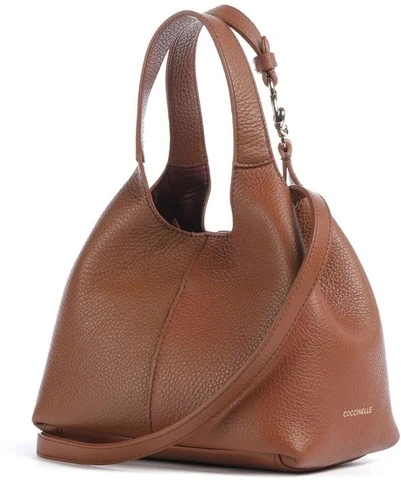 Kelioninis Koniakowa mini torebka do ręki Coccinelle E1 SHA 58 01 01 W11