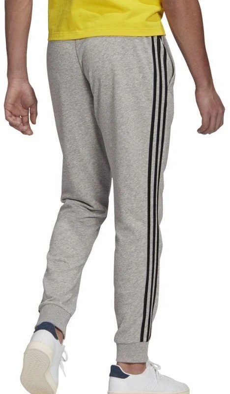 Adidas Essentials Kelnės su siaurėjančiais rankogaliais ir 3 juostelėmis M GK8889