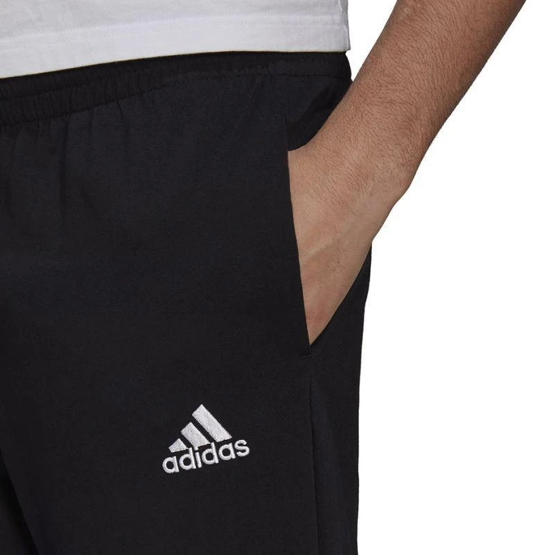 Adidas Essentials siaurėjančios atviro krašto kelnės M GK9222