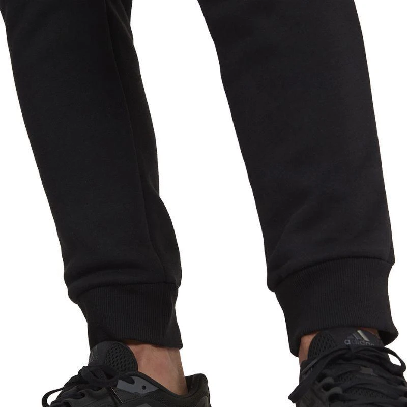 adidas Essentials su karinio rašto raštu Fleece kelnės M HL6929