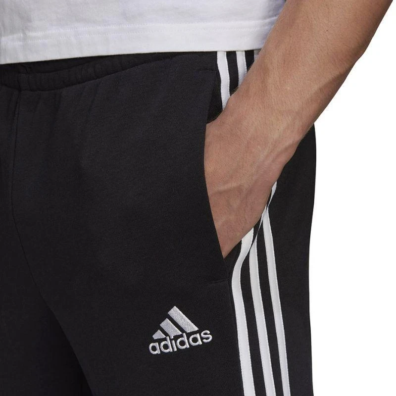 adidas Essentials Tapered Cuff 3 Stripes M GK8831 kelnės