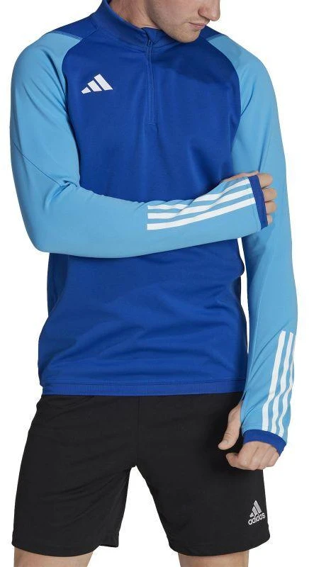 Adidas Tiro 23 Competition Training Top M HU1309 |” Pasiruoškite varžyboms su „Adidas Tiro 23 Competition“ treniruočių viršutine dalimi. Sukurta atlikti treniruočių metu, ši viršutinė dalis pasižymi drėgmę sugeriančia „AEROREADY“ technologija, kur