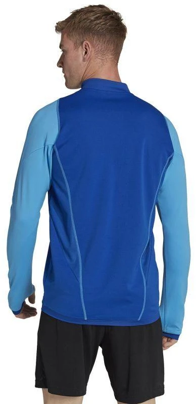 Adidas Tiro 23 Competition Training Top M HU1309 |” Pasiruoškite varžyboms su „Adidas Tiro 23 Competition“ treniruočių viršutine dalimi. Sukurta atlikti treniruočių metu, ši viršutinė dalis pasižymi drėgmę sugeriančia „AEROREADY“ technologija, kur