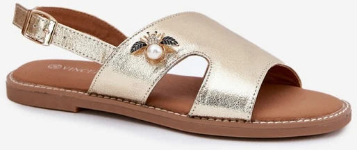 Auksinės basutės su dekoratyvine detale Step in style