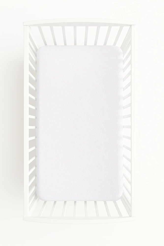 Įtemptas frotinis paklotėlis kūdikių lovytei 120x60 cm baltas