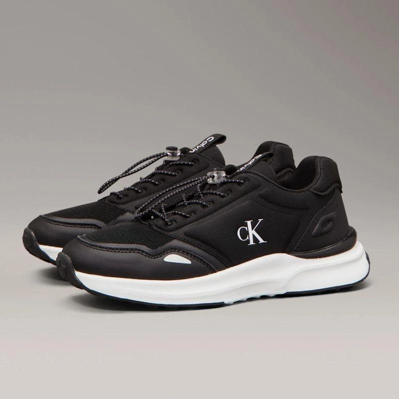 Calvin Klein moteriški žemo kirpimo suvarstomi sportbačiai V3X9-83010-1464999 JUODI