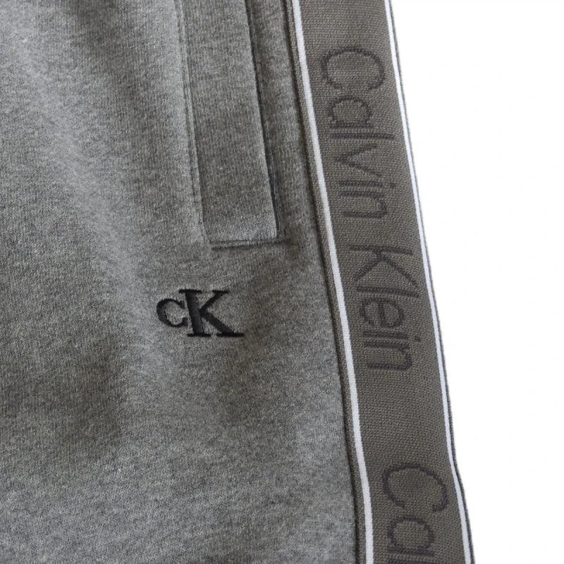 Calvin Klein vilnonės sportinės kelnės su logotipu šonuose, pilkos spalvos - LZ04LE291G-P7E