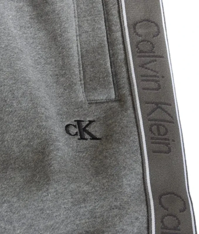 Calvin Klein vilnonės sportinės kelnės su logotipu šonuose, pilkos spalvos - LZ04LE291G-P7E