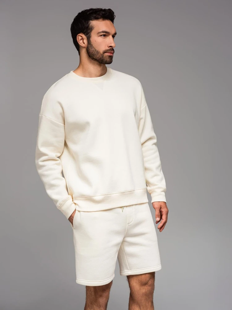 Džemperis unisex kreminės spalvos su apvalia iškirpte