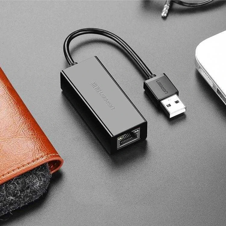 Tinklo adapteris UGREEN CR110 USB į RJ45 (juodas)