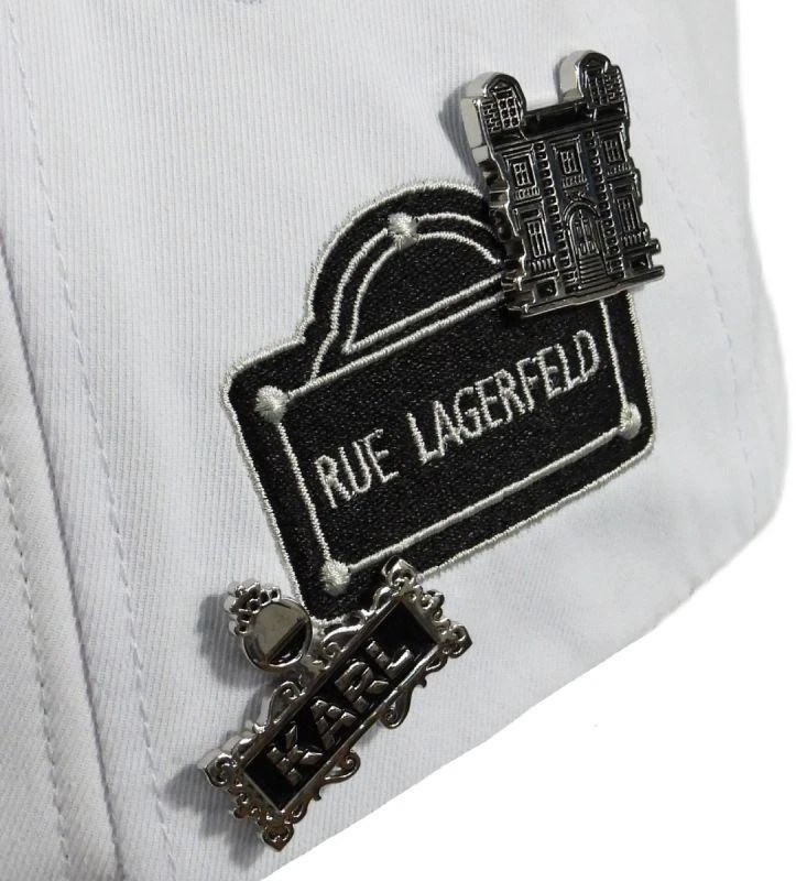 Karl Lagerfeld Paris balta kepurė su dirželiu – L5WH7947-wht