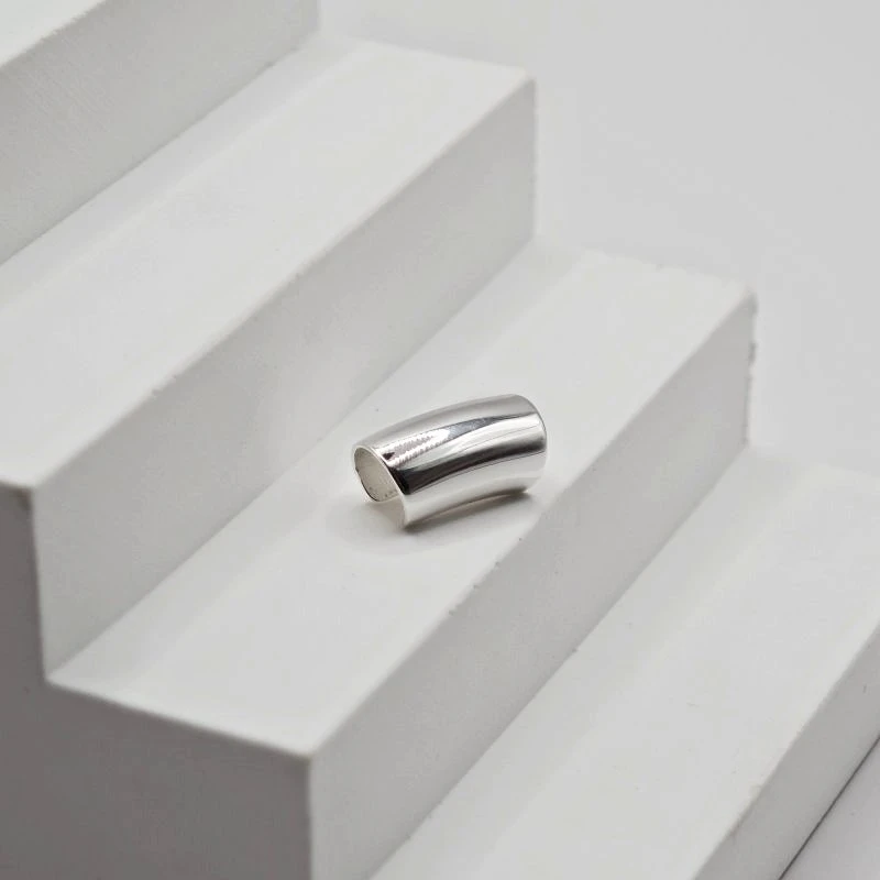 Kremzlės auskaras Capsule