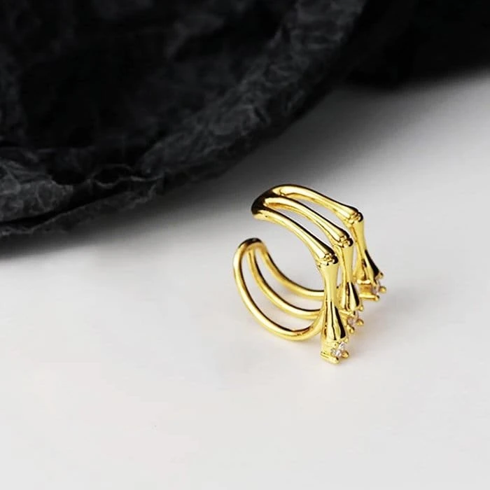 Kremzlės auskaras Gold Claws