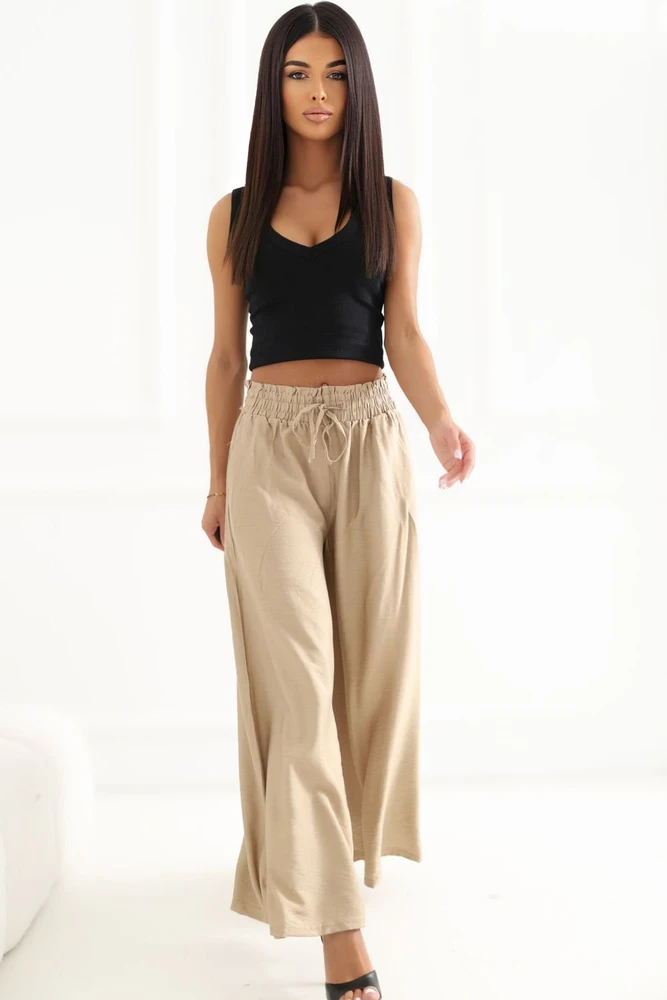 Kupranugario spalvos platios moteriškos kelnės su sutraukiamu juosmeniu