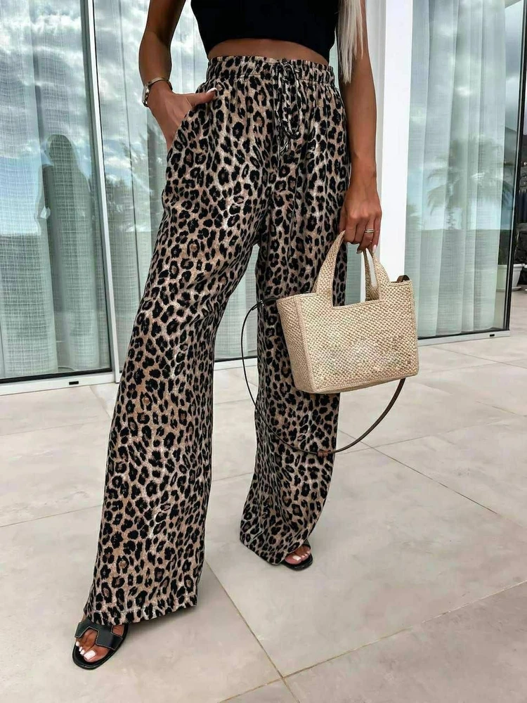 Leopardo rašto kelnės