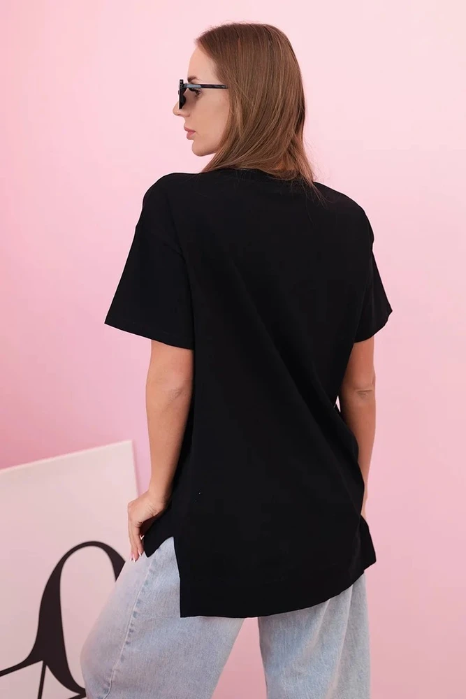 Moteriška juoda oversize palaidinė su širdimi ir kutais