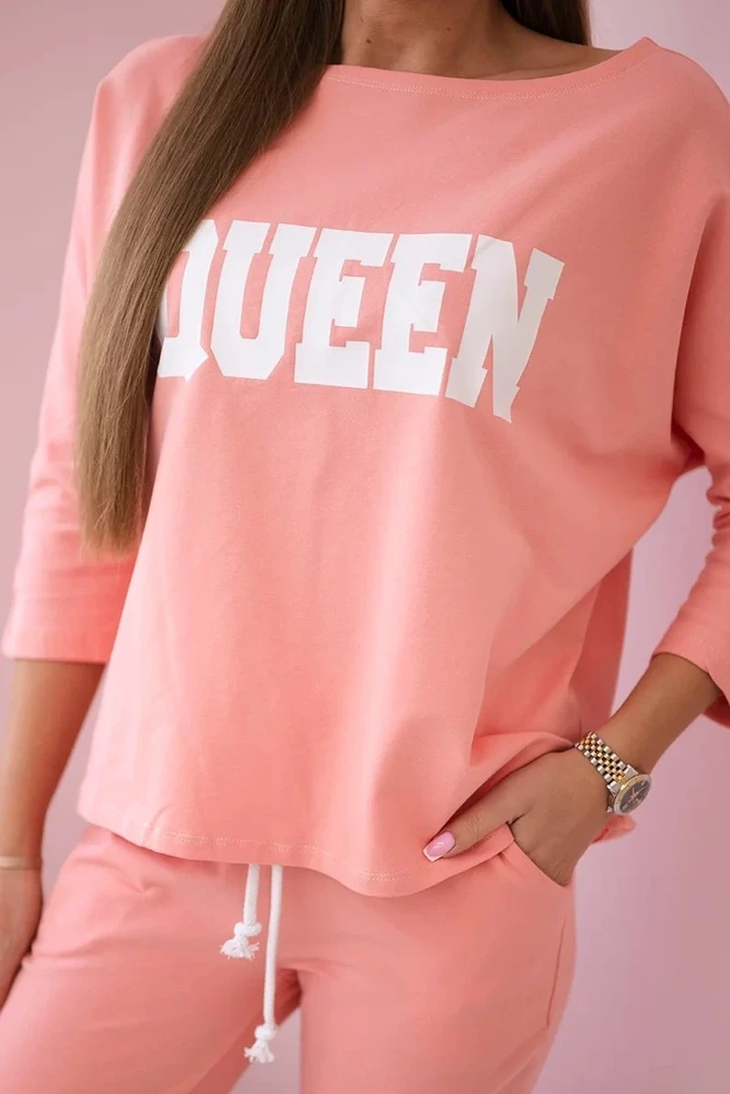 Moteriškas komplektas: palaidinė su „Queen“ ir kelnės, persikinis