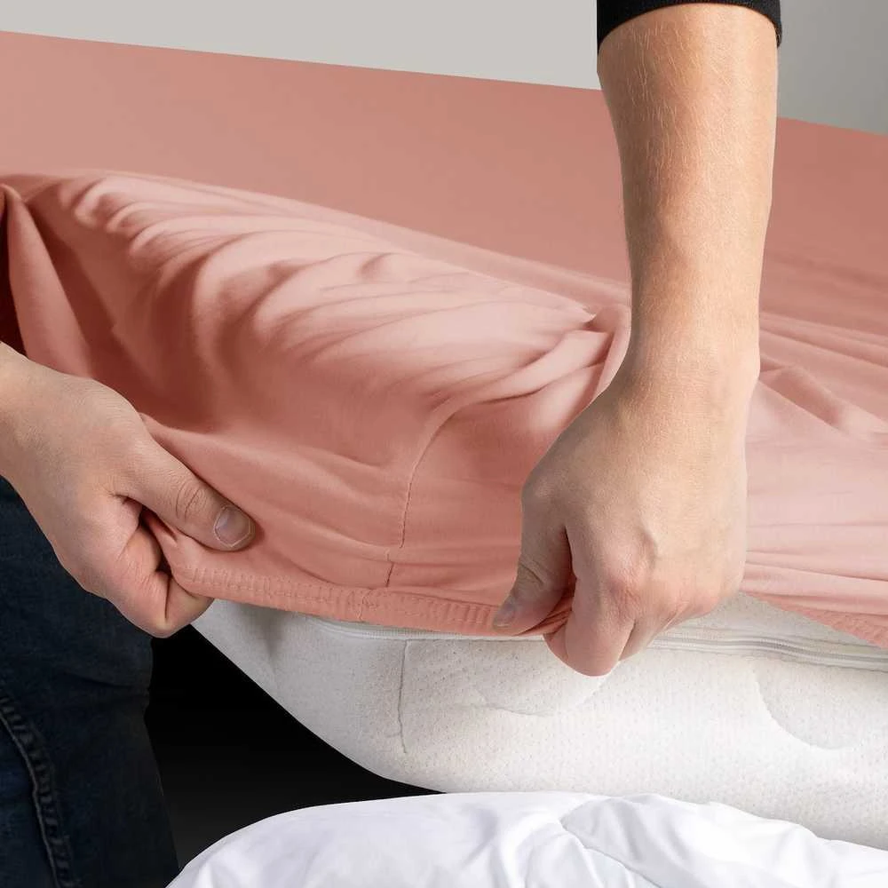 DecoKing Paklodė su guma persiko spalvos 80–90x200+30 cm