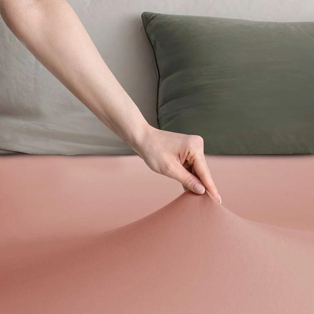 DecoKing Paklodė su guma persiko spalvos 80–90x200+30 cm