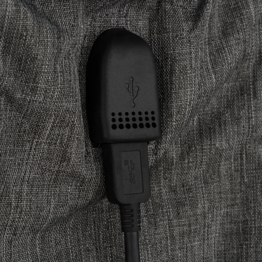 Pojemny plecak dla mamy wykonany su poliestru w ciemnoszarym kolorze, wyposażony w port USB - Peterson