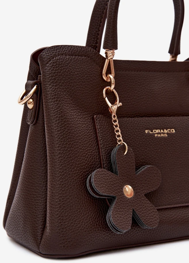 Ruda rankinė per petį su gėlytės pakabuku Flora&Co Paris