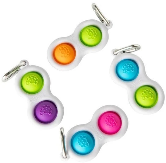 Fat Brain Toys Sensorinis žaislas - raktų pakabukas „Simpl Dimpl“ (įvairių spalvų)