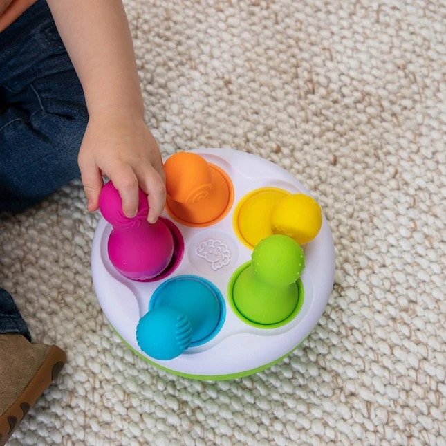 Tomy Sensorinis žaislas „SpinnyPins”