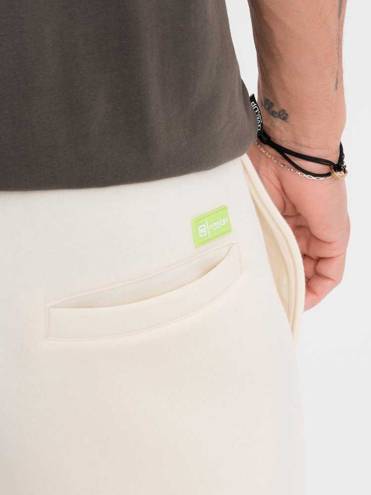 Šortai unisex kreminės spalvos su raišteliu