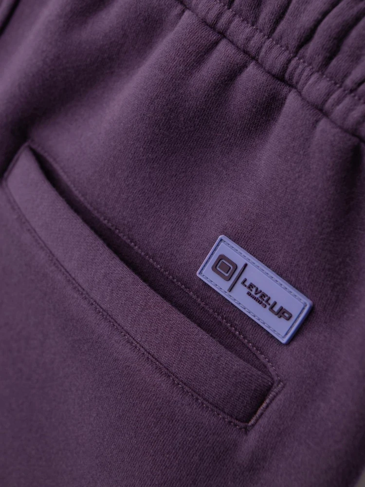 Šortai unisex su raišteliu violetinės spalvos