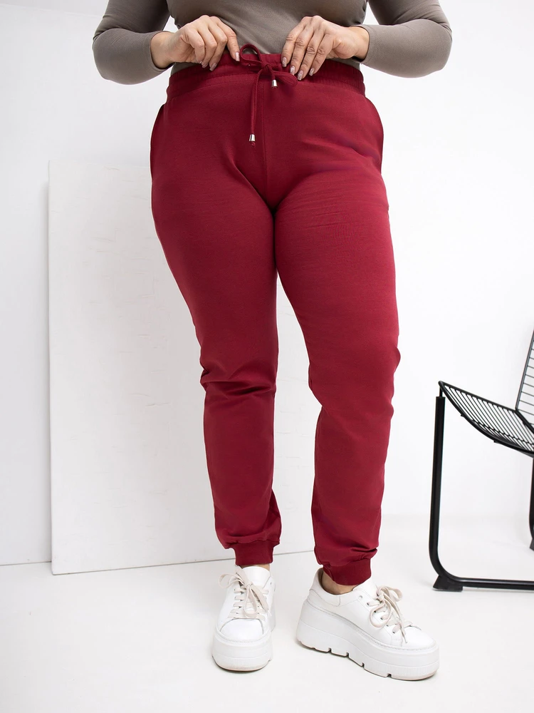 Sportinės kelnės moterims plus size bordo spalvos