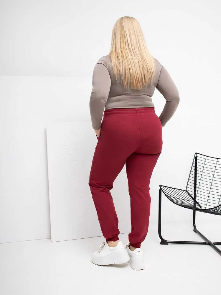 Sportinės kelnės moterims plus size bordo spalvos