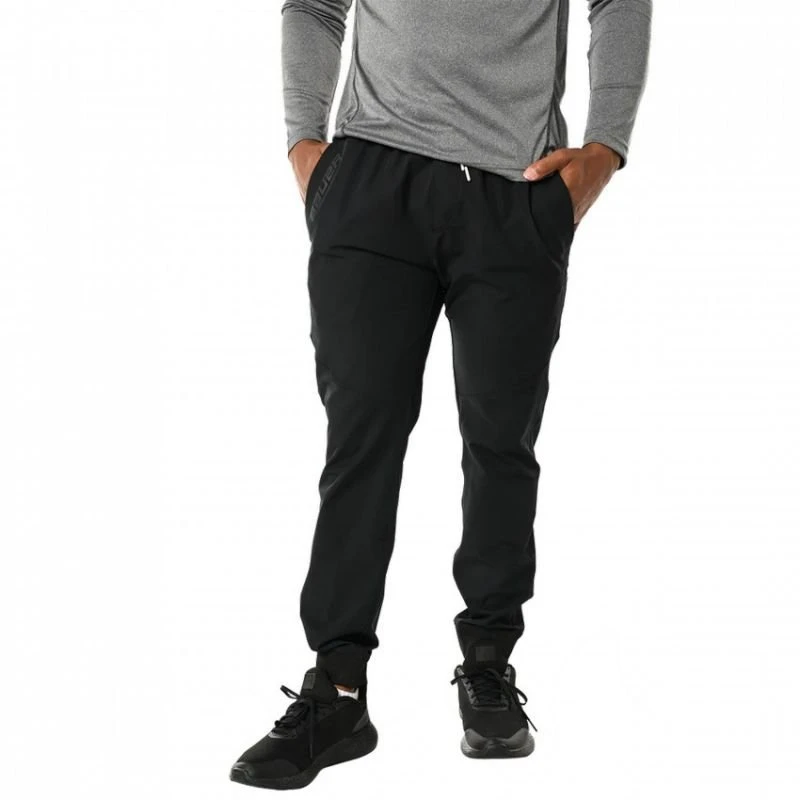 Sportinės kelnės su siaurėjančiu kirpimu Bauer Team Woven Jogger