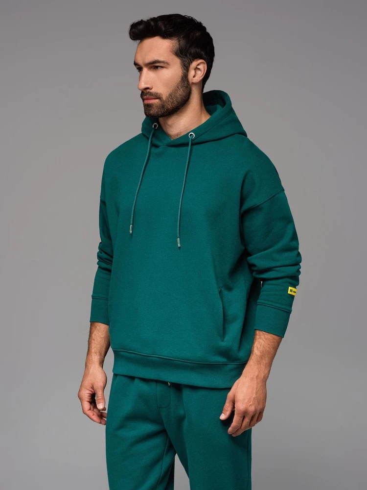 Sportinis kostiumas tamsiai žalios spalvos su gobtuvu ir suvarstomomis kelnėmis unisex