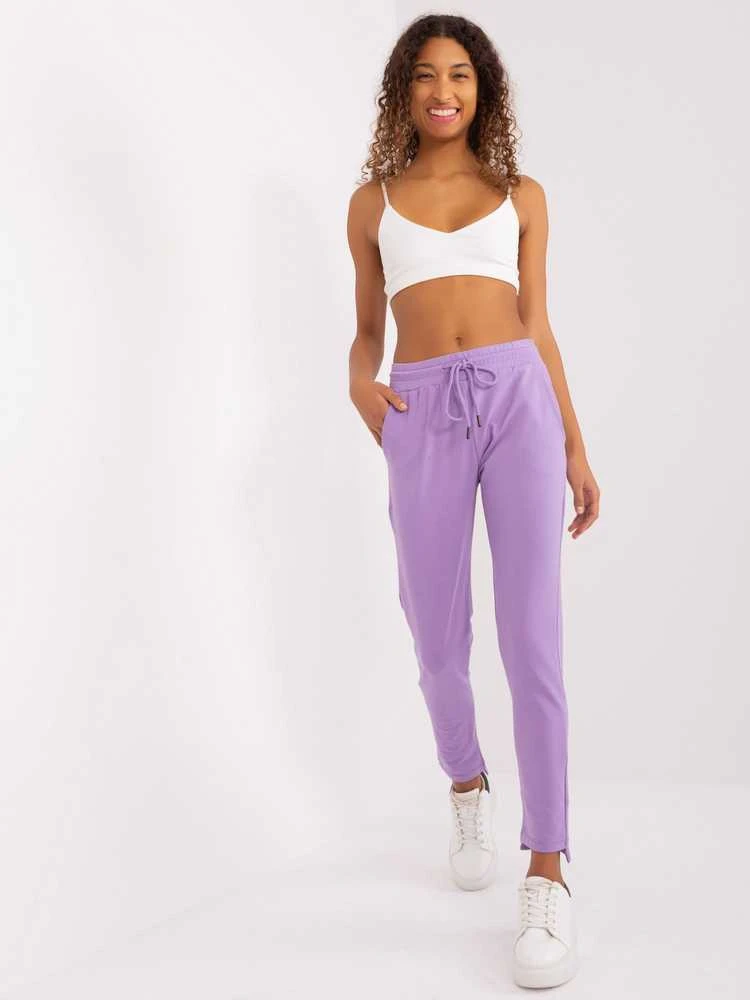 Šviesiai violetinės sportinės kelnės