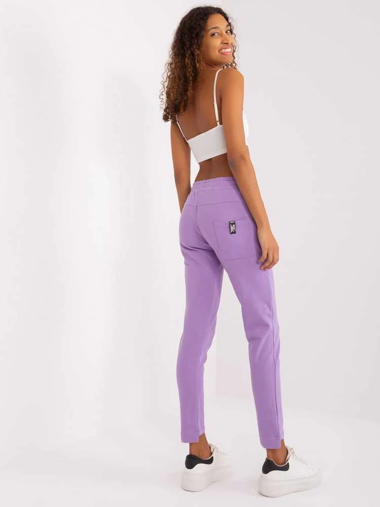 Šviesiai violetinės sportinės kelnės