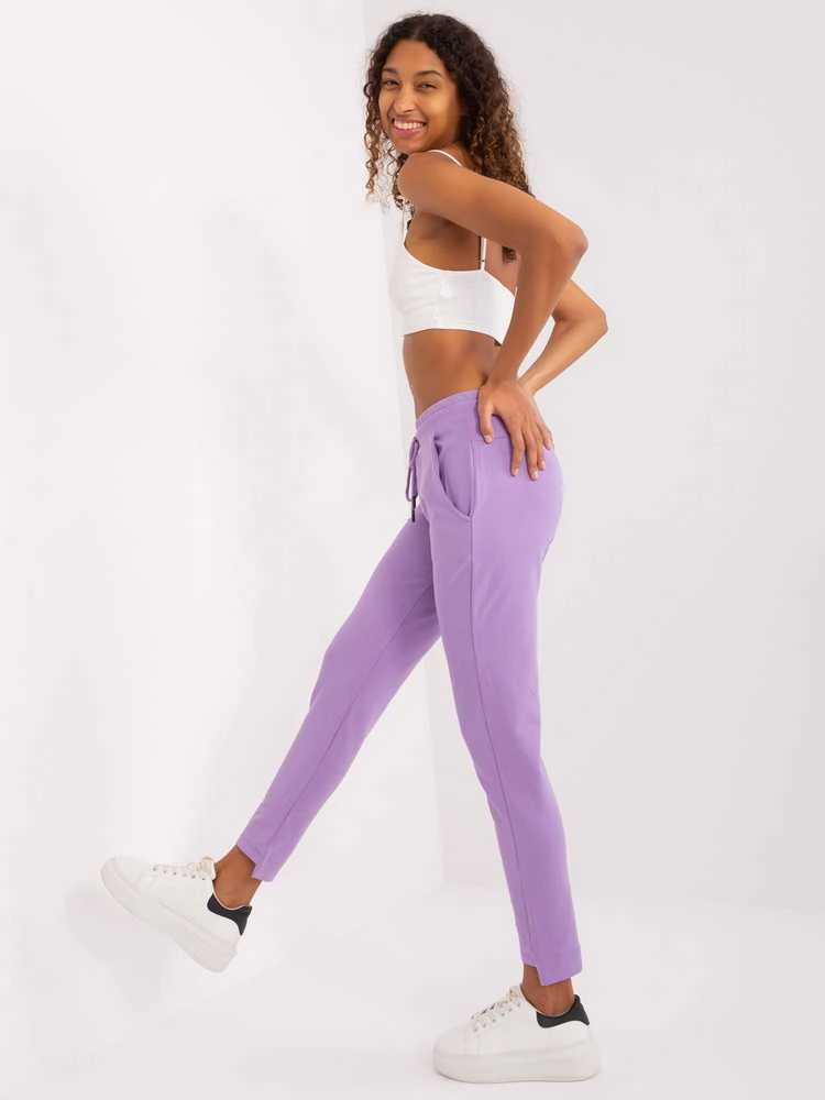 Šviesiai violetinės sportinės kelnės