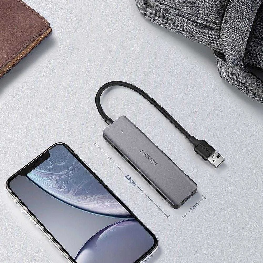 4-in-1 adapteris UGREEN USB Hub prie 4x USB 3.0 + USB-C (pilka)