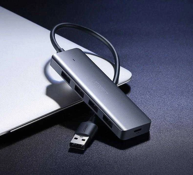 4-in-1 adapteris UGREEN USB Hub prie 4x USB 3.0 + USB-C (pilka)