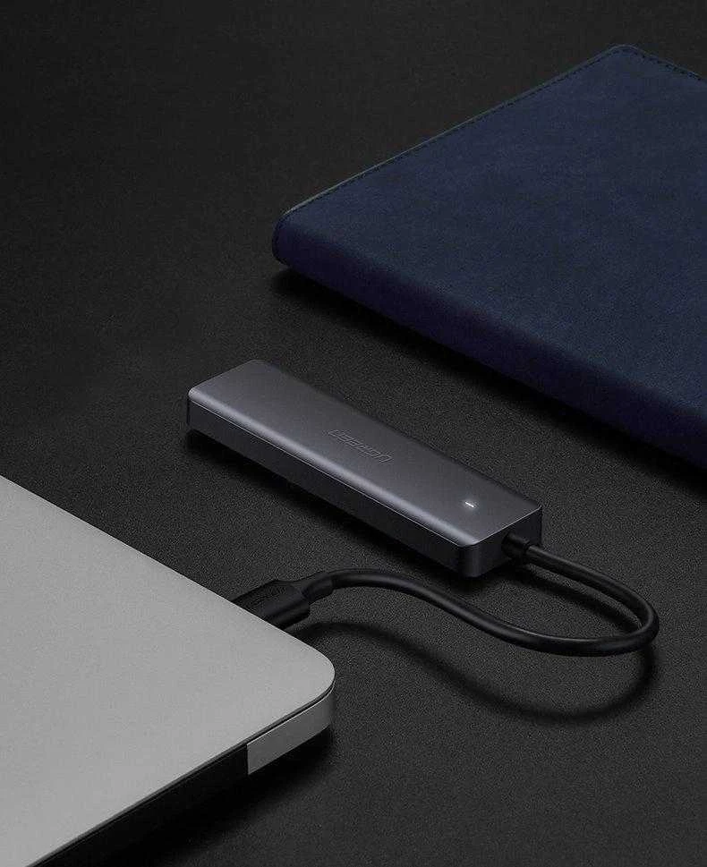 4-in-1 adapteris UGREEN USB Hub prie 4x USB 3.0 + USB-C (pilka)