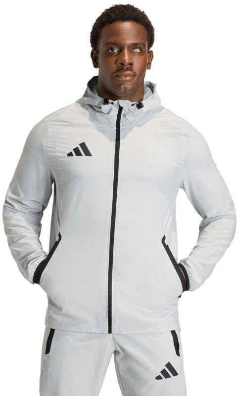 Vyriška adidas Tiro 26 kelioninė striukė nuo vėjo, šviesiai pilka KD3336