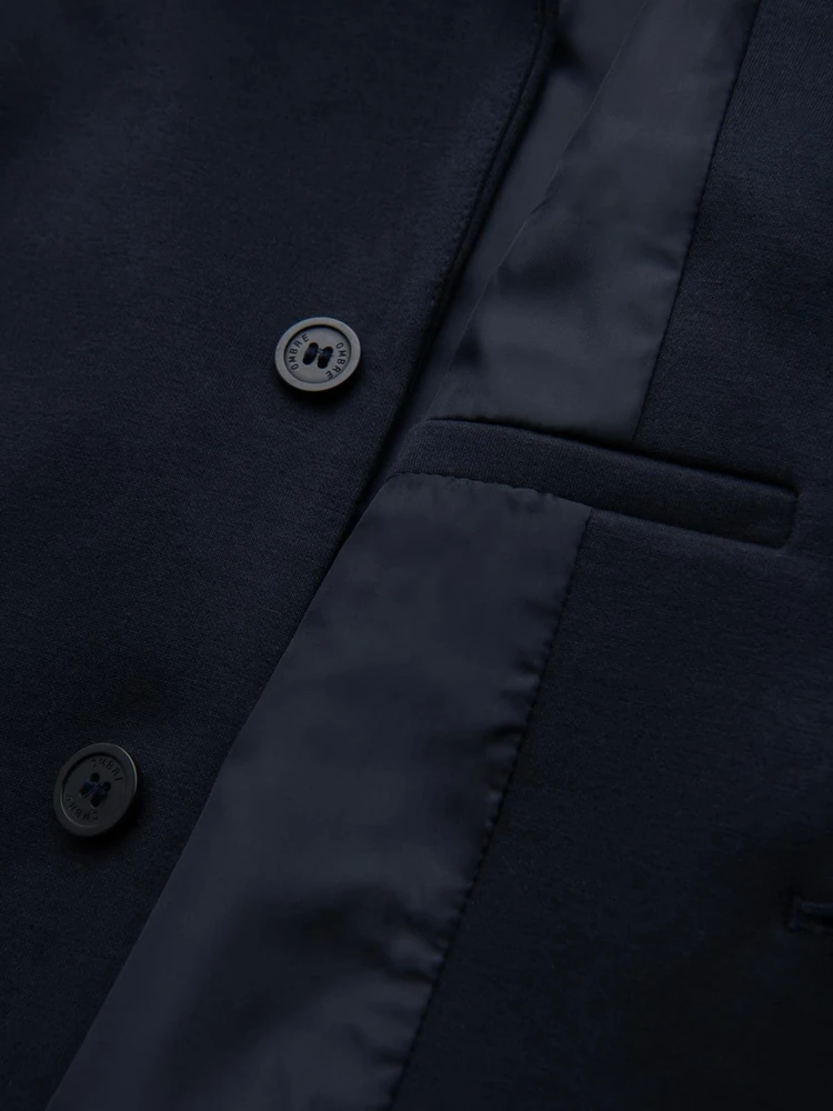 Vyriškas tamsiai mėlynas švarkas siauresnio kirpimo
