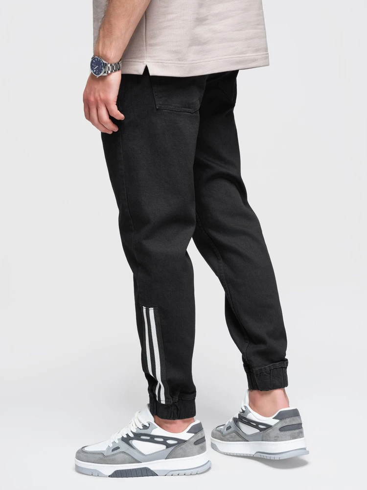Vyriškos juodos jogger tipo kelnės su juostele