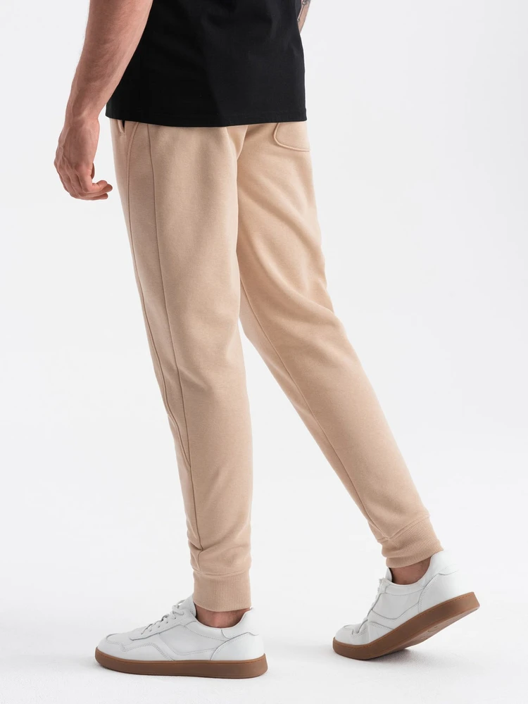 Vyriškos smėlio spalvos medvilninės jogger tipo kelnės su kišenėmis