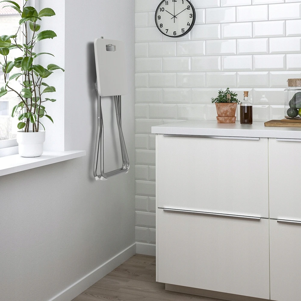 Balta sulankstoma taburetė IKEA GUNDE Balta sulankstoma taburetė, keliamoji galia iki 100 kg