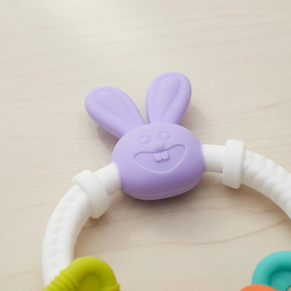 Bocioland Sensory Teether silikoninis zuikis su pakabukais 0m+