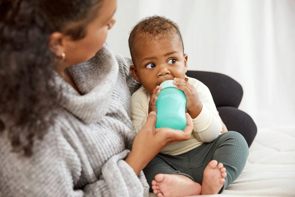 Buteliukas kūdikiui su čiulptuku 0-3m 150 ml STIKLAS + SILIKONAS Everyday Baby