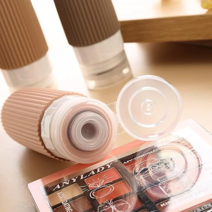 Ecarla Rinkinys 4 kelioninių silikoninių buteliukų 90ml su dėklu