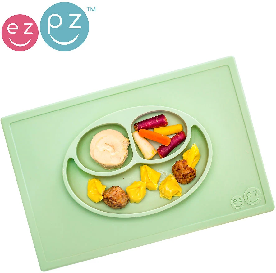 EZPZ silikoninė plokštelė su padu 2in1 Happy Mat pastelinės žalios spalvos
